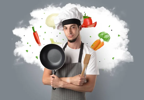 Λαχανικά σε σύννεφο με αρσενικό cook — Φωτογραφία Αρχείου