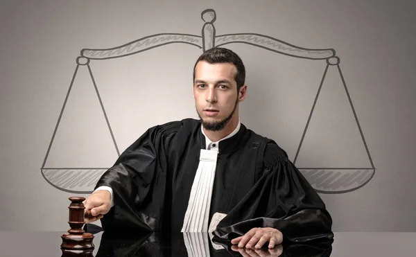 Young judge in gown deciding — Stock Photo, Image