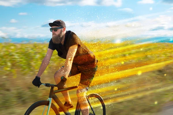 Young riding bicycle in nature — Stock Photo, Image