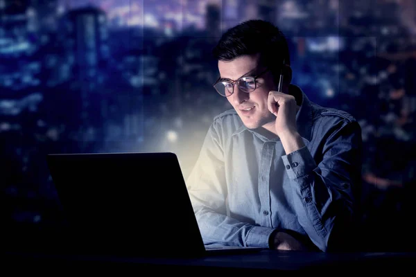 Businessman in the office at night — Stock Photo, Image