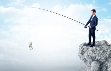 İşadamı Balık tutma Doları bir rock