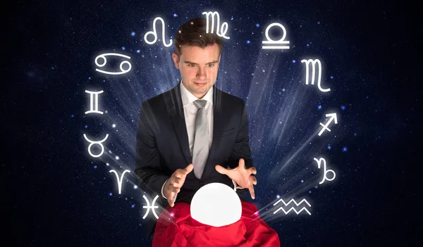 Astronaut looking for inspiration in his crystal magic ball — Stock Photo, Image