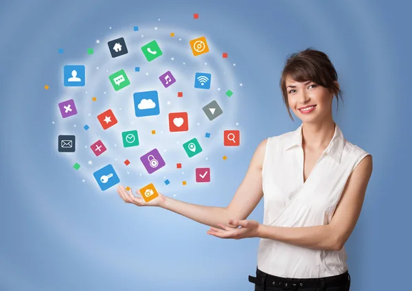 Person presenting new application icons and symbols — Stock Photo, Image