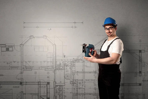 Worker with technical drawing. — Stock Photo, Image