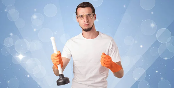 Glittered background with male housekeeper — Stock Photo, Image