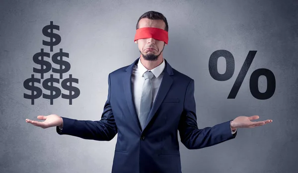 Man with ribbon on his eye holding dollar signs — Stock Photo, Image