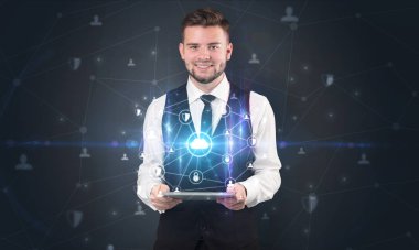 Güvenli bulut kavramı ile işadamı ve tablet