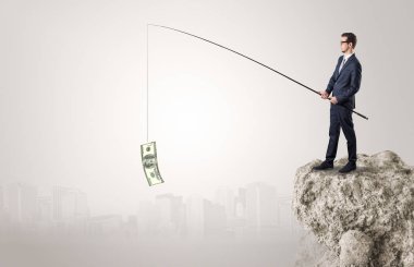 İşadamı Balık tutma Doları bir rock