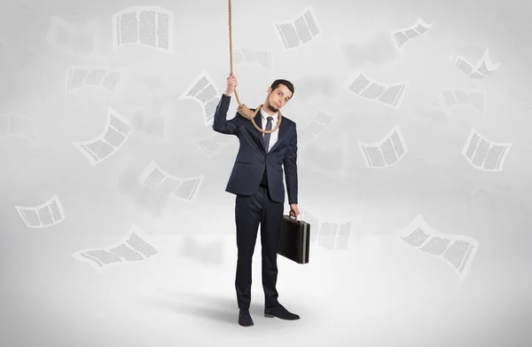 Burnout businessman with flying documents concept — Stock Photo, Image