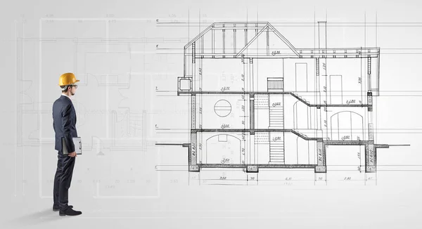 Architetto in cerca di un piano di casa — Foto Stock