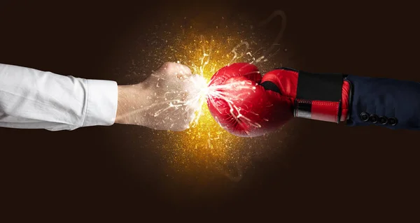 Fighting hands with orange explosion concept — Stock Photo, Image