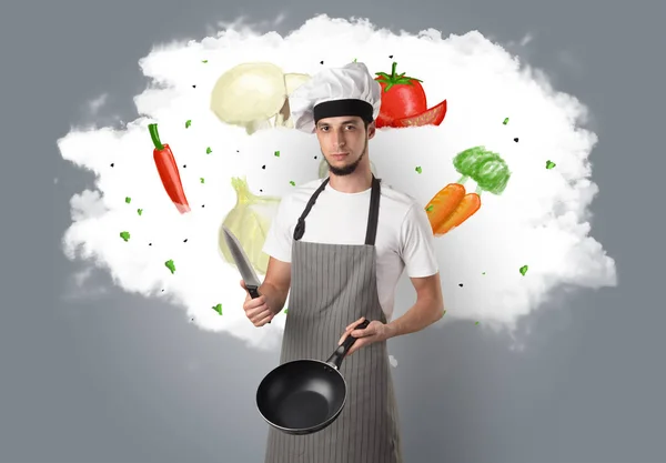 Λαχανικά σε σύννεφο με αρσενικό cook — Φωτογραφία Αρχείου