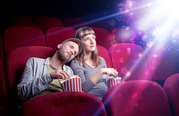 Romantic couple sitting at spectacle — Stock Photo, Image