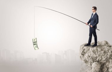 İşadamı Balık tutma Doları bir rock
