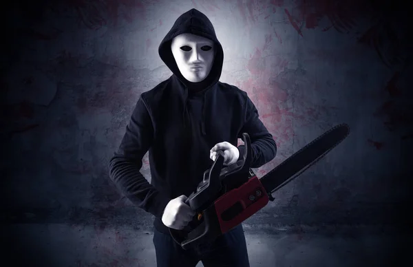 Armed assassin in an empty bloody room concept — Stock Photo, Image