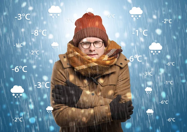 Boy freezing in warm clothing with weather condition concept — Stock Photo, Image