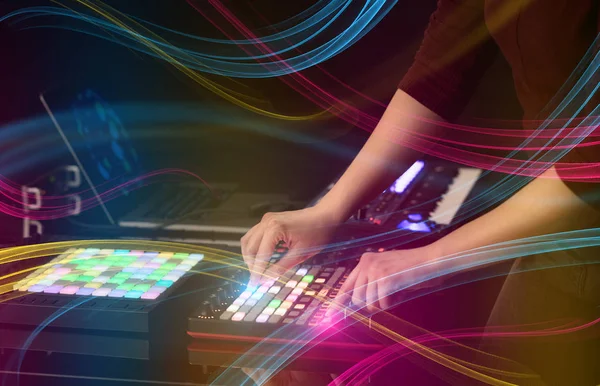 Mixing music on midi controller with colorful vibe concept — Stock Photo, Image