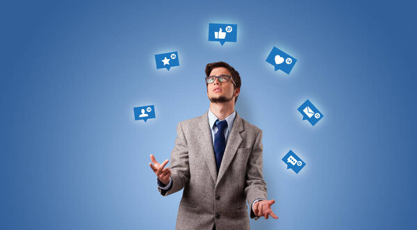 Person juggle with social media symbols
