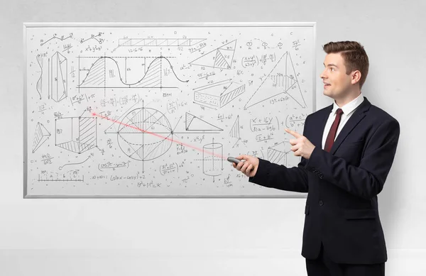 Professor on whiteboard teaching geometry