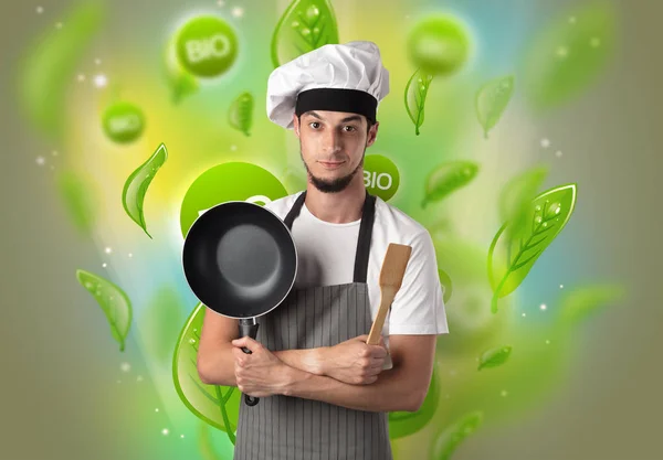 Bio bladeren concept en cook portret — Stockfoto