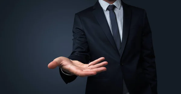 Businessman handing something without concept — Stock Photo, Image