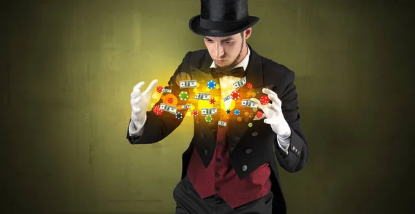 Illusionist conjure with his hand gambling staffs Royalty Free Stock Photos