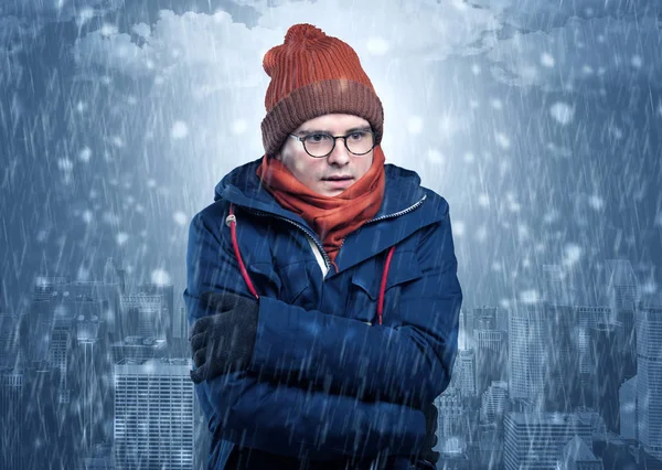 Boy freezing in cold weather with city concept — Stock Photo, Image