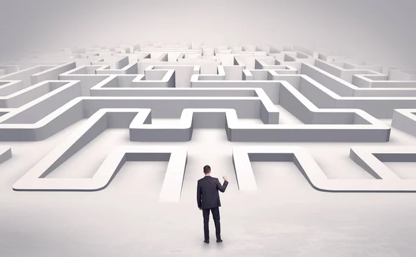 Businessman starting a flat 3d labyrinth — Stock Photo, Image