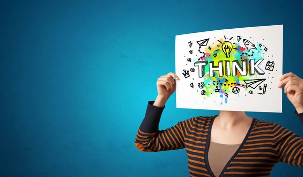 Person holding paper with design thinking concept — Stock Photo, Image