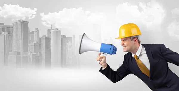 Architect standing and yelling to far big city panorama — Stock Photo, Image