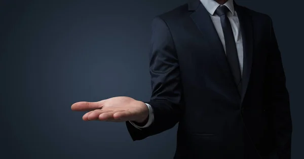 Businessman handing something without concept — Stock Photo, Image