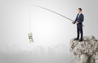 İşadamı Balık tutma Doları bir rock