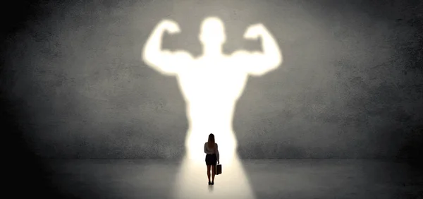 Woman standing in front of a strong hero vision — Stock Photo, Image