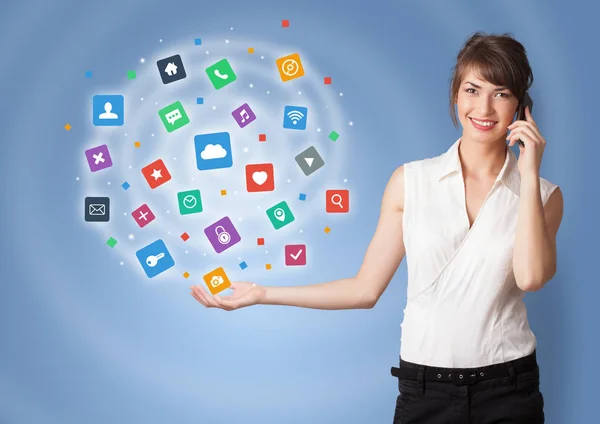 Person presenting new application icons and symbols — Stock Photo, Image