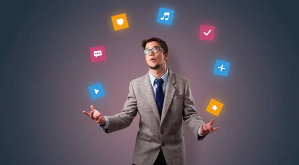 Person juggle with application icons — Stock Photo, Image