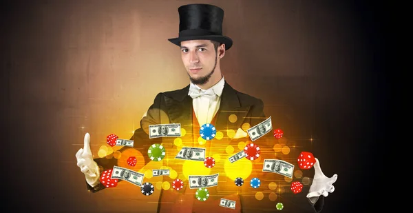 Iluzionista vykouzlit s rukou hazard štáby — Stock fotografie