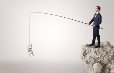 İşadamı Balık tutma Doları bir rock
