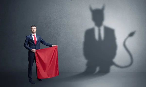 Zakenman met schaduw en toreador concept van de duivel — Stockfoto
