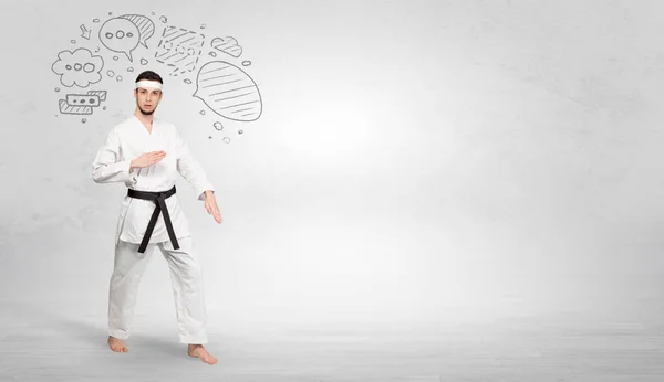 Entrenador de karate luchando con el concepto de símbolos garabateados — Foto de Stock