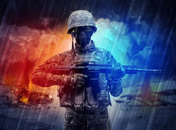 Armed soldier standing in the middle of dust storm — Stock Photo, Image