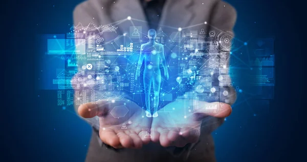 Young person holding hologram projection with health concept — Stock Photo, Image