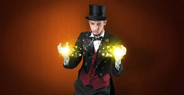 Illusionist holding superpower on his hand — Stock Photo, Image