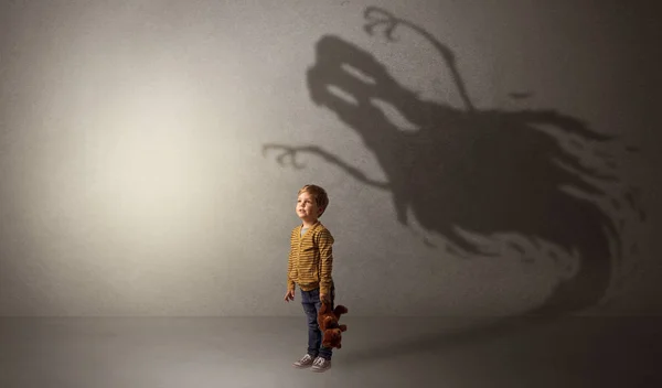 Scary ghost shadow behind kid — Stock Photo, Image