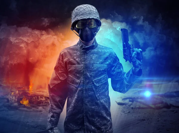 Armed soldier standing in the middle of dust storm — Stock Photo, Image