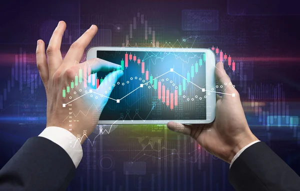 Hand holding tablet with global reports and stock market change concept — Stock Photo, Image