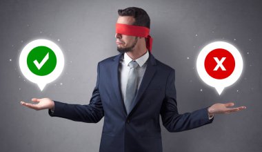Blindfolded businessman trying to choose clipart