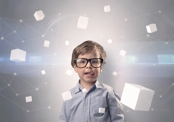 Cute kid with luminous cubes around — Stock Photo, Image