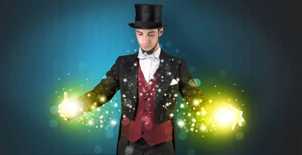 Illusionist holding superpower on his hand — Stock Photo, Image