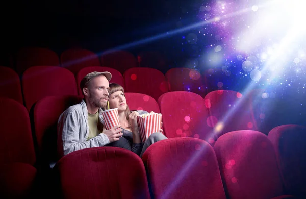 Romantic couple sitting at spectacle — Stock Photo, Image