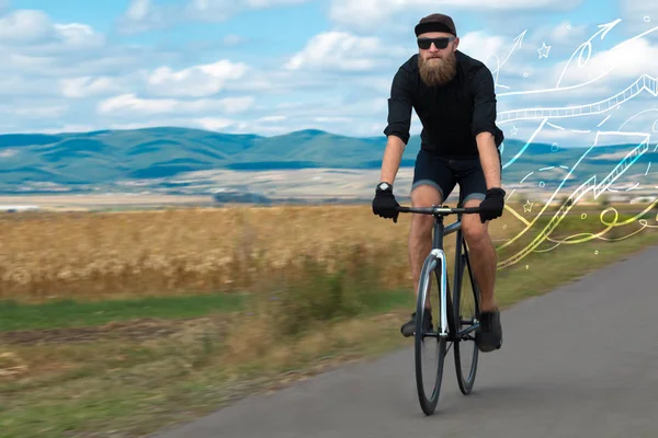 Jeune cycliste avec fond de prairie — Photo